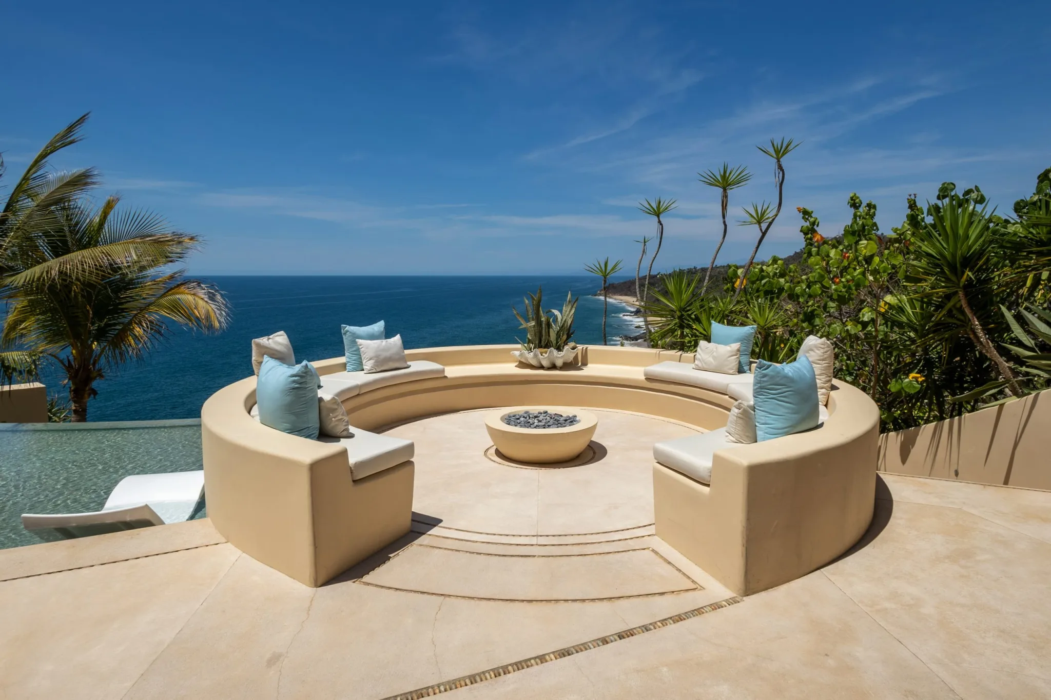 Ocean-view terrace pictured in the retreat property gallery.