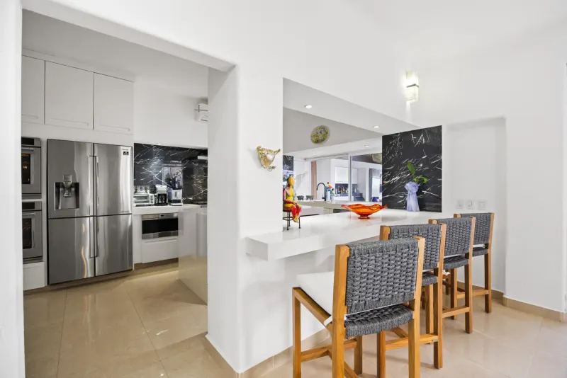 Kitchen pictured with Villa Xzavian.