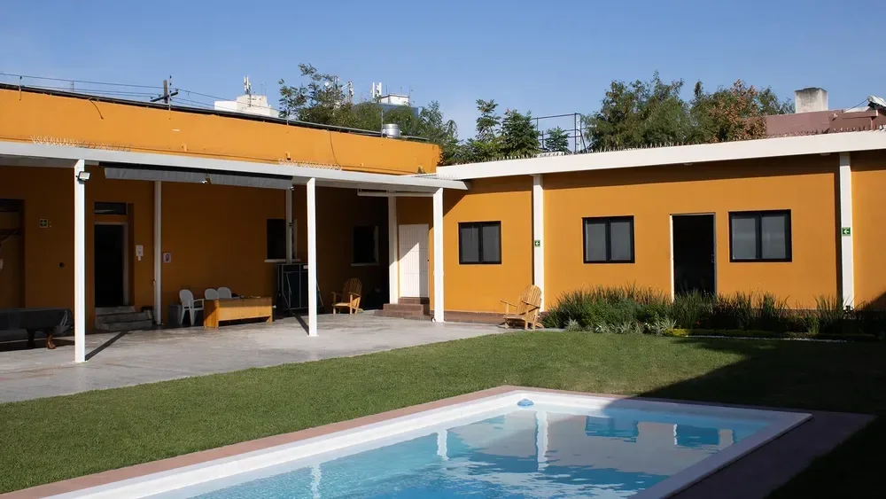 Lumenia’s central courtyard with a garden and pool