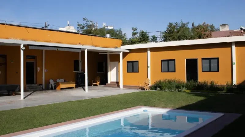 Lumenia’s central courtyard with a garden and pool