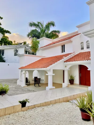 Residence exterior pictured by Cancun Wellness.