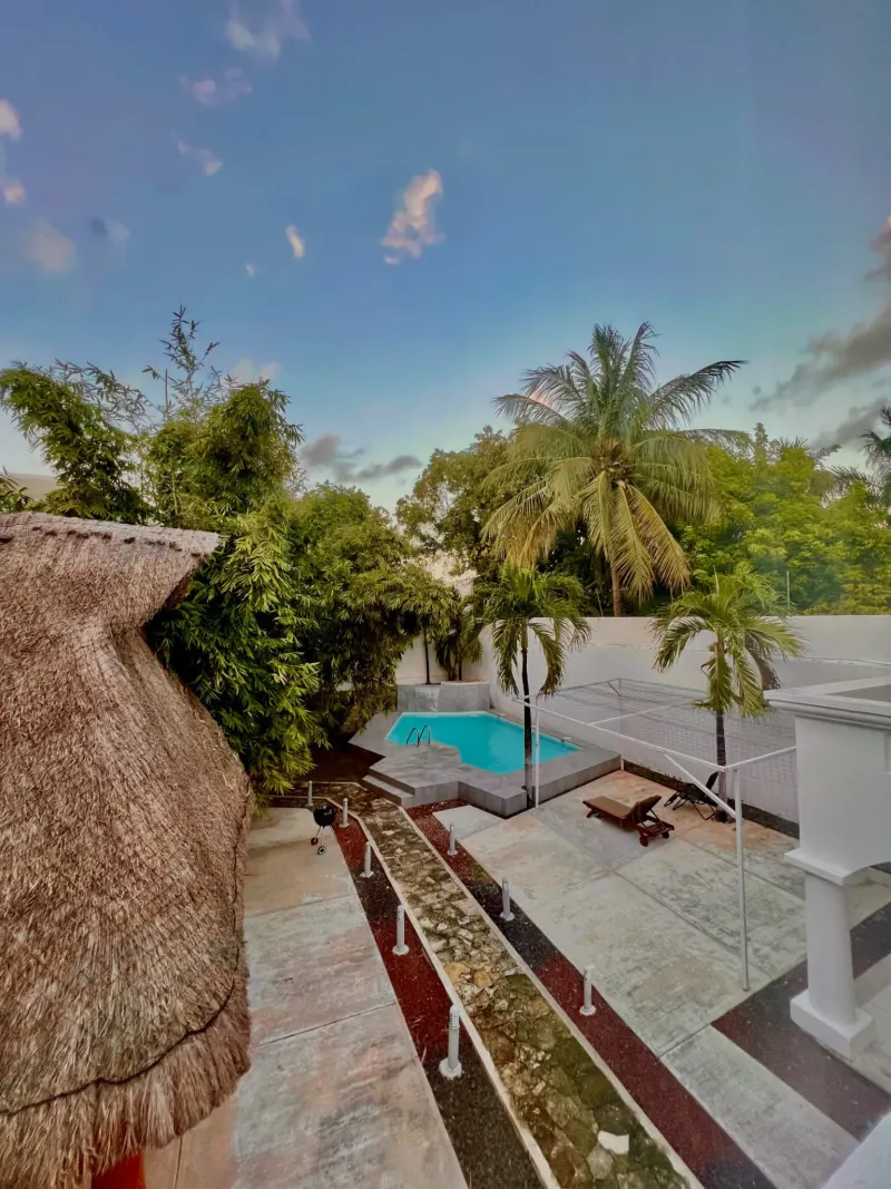 Pool and terrace pictured by Cancun Wellness.