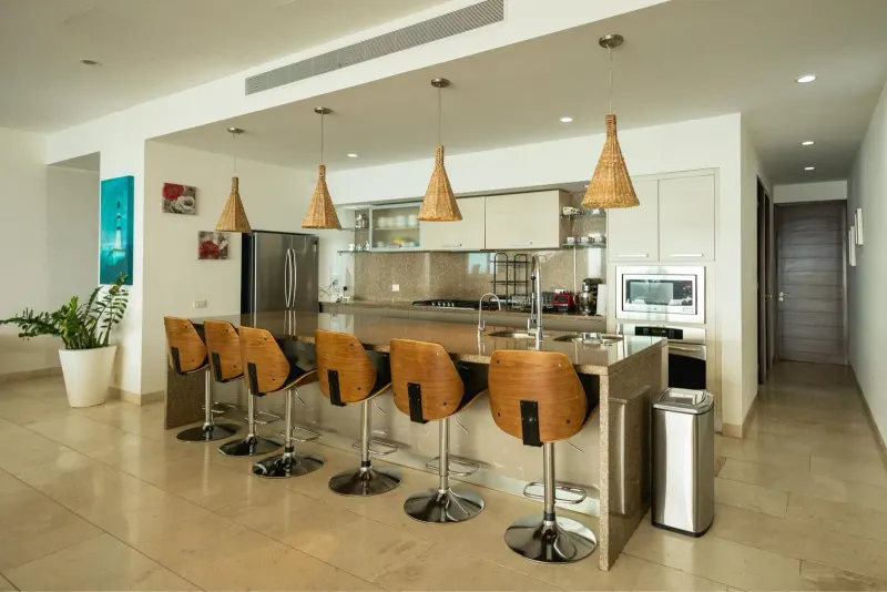 Kitchen and shared dining space pictured in Kambo’s retreat gallery.