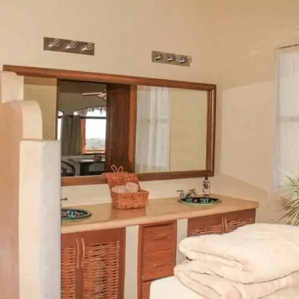 Bathroom vanity and counter with folded towels