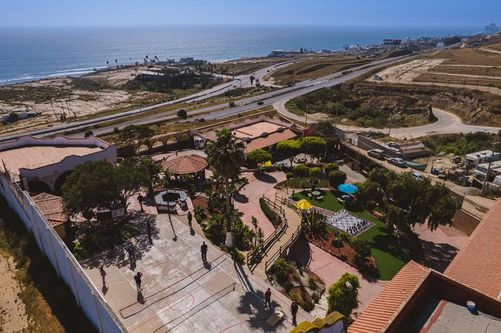 Aerial view of the Baja Rehab grounds with the coastal road and Pacific Ocean in the distance