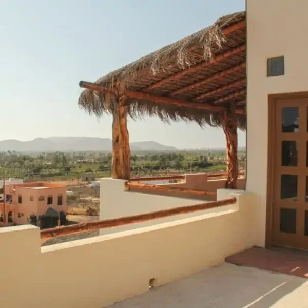 Shaded upstairs terrace beside the residence