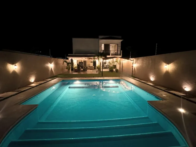 Pool at night shown in the MindScape facility gallery.