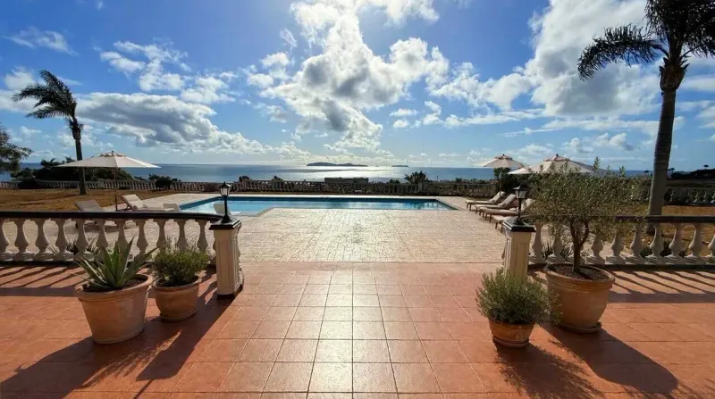 Ocean-facing terrace and pool shown at Casa Santa Isabel.