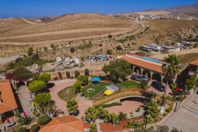 Aerial view of the Baja Rehab courtyard, landscaped paths and surrounding hills