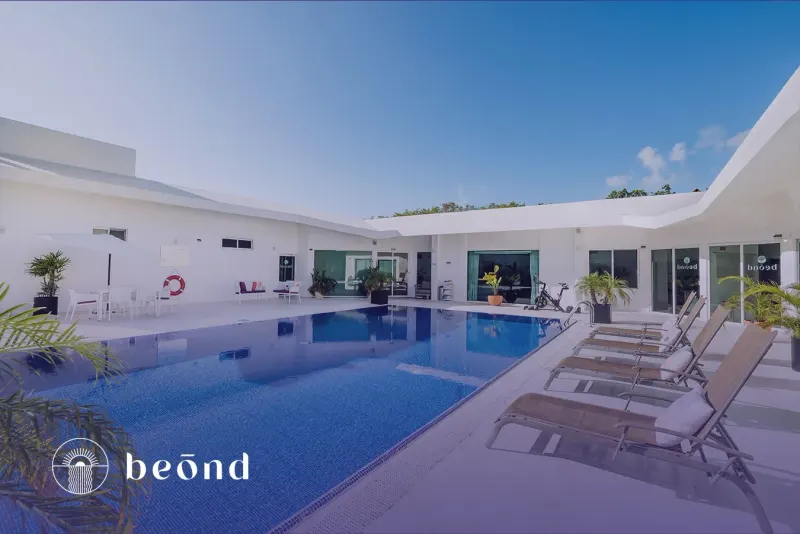 Pool and shared outdoor spaces at Beond.